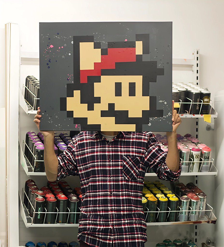 Portrait pixelisé de Mario par mr1pointc2. Art urbain unique inspiré des jeux vidéo classiques, style 2025.