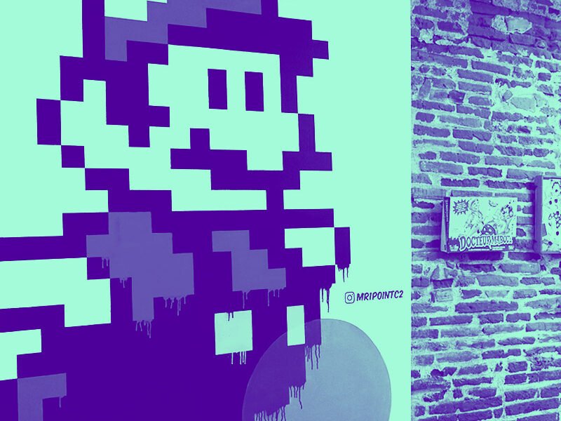 Art mural pixelisé : personnage de jeu vidéo rétro sur fond coloré. Ambiance vintage.